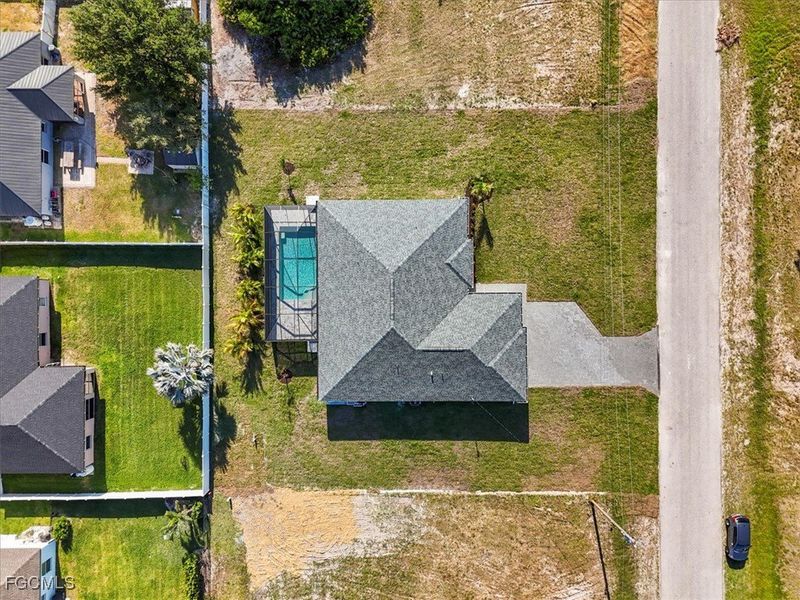 Front exterior of a new home in Cape Coral, Cape Coral, FL, highlighting curb appeal (Image 21).