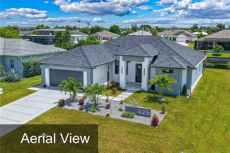 Front exterior of a new home in , Cape Coral, FL, highlighting curb appeal (Image 20). Front exterior of a new home in , Cape Coral, FL, highlighting curb appeal (Image 20).