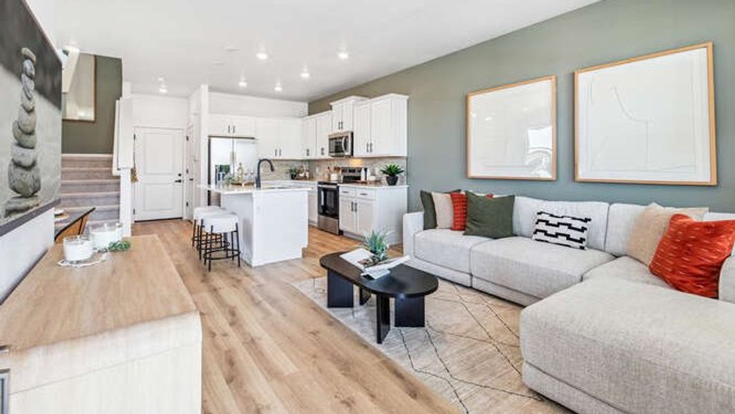 Representative furnished interior of a home built from the Melbourne by D.R. Horton in Arcadia, Denver (Image 6).