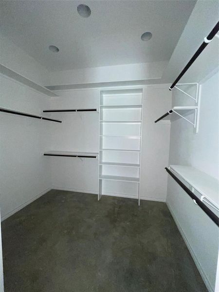 Spacious Primary Closet Spacious Primary Closet