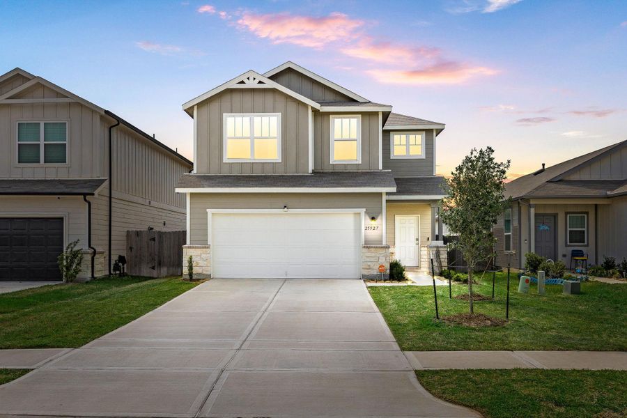 Front exterior of a new home in Decker Farms, Magnolia, TX, highlighting curb appeal (Image 20). Front exterior of a new home in Decker Farms, Magnolia, TX, highlighting curb appeal (Image 20).