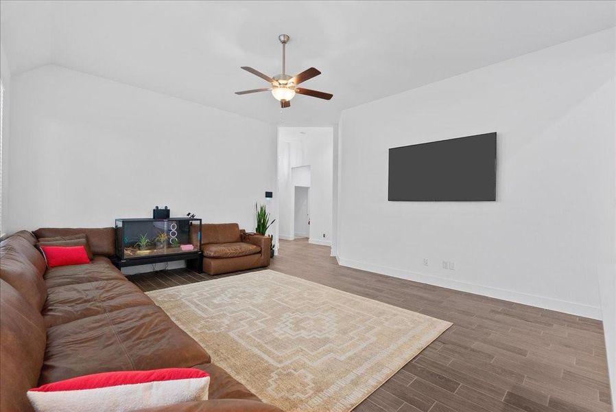 With plenty of room for furniture, gatherings, and everyday moments, this oversized family room provides the perfect backdrop for making memories. With plenty of room for furniture, gatherings, and everyday moments, this oversized family room provides the perfect backdrop for making memories.