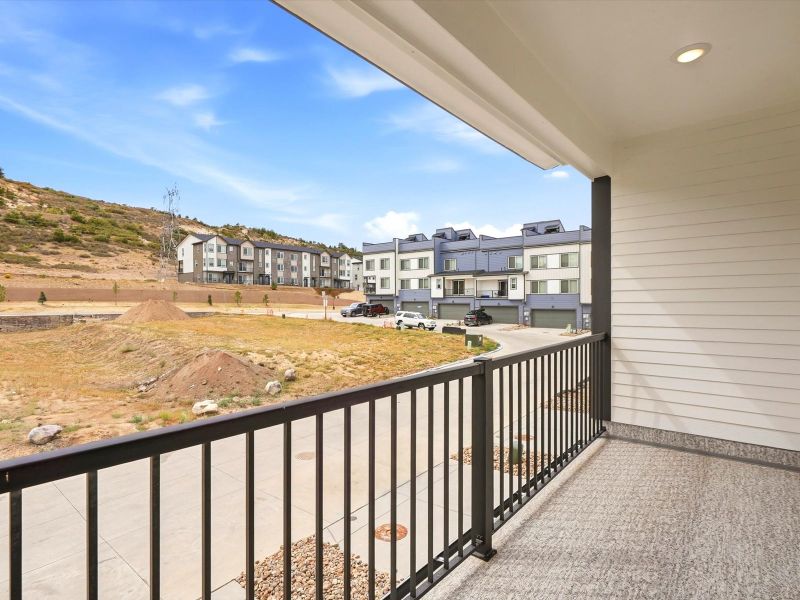 Exterior details and patio area of a home in Three Hills, Morrison (Image 15).