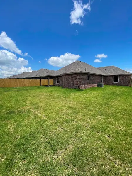 Exterior details and patio area of a home in , Springtown (Image 4).