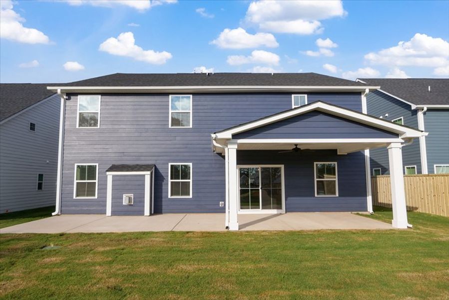 Exterior details and patio area of a home in Canterbrook Farms 2-Story, Fountain Inn (Image 19).