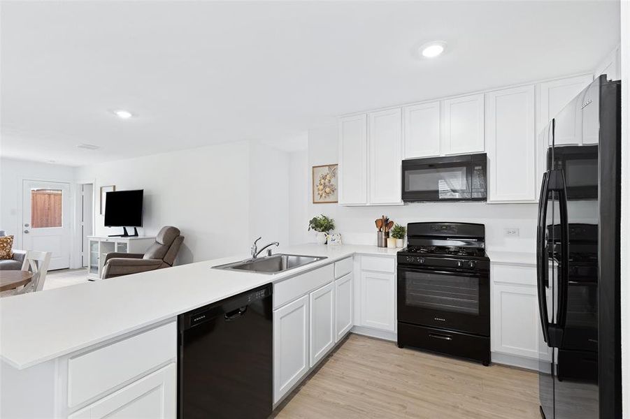 Furnished interior view inside a new home in Mobberly Farms, Pilot Point (Image 7).