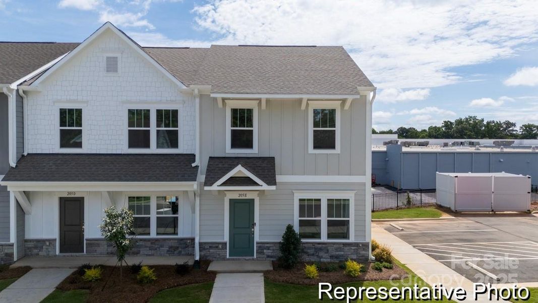 Front exterior of a new home in , Concord, NC, highlighting curb appeal (Image 1).