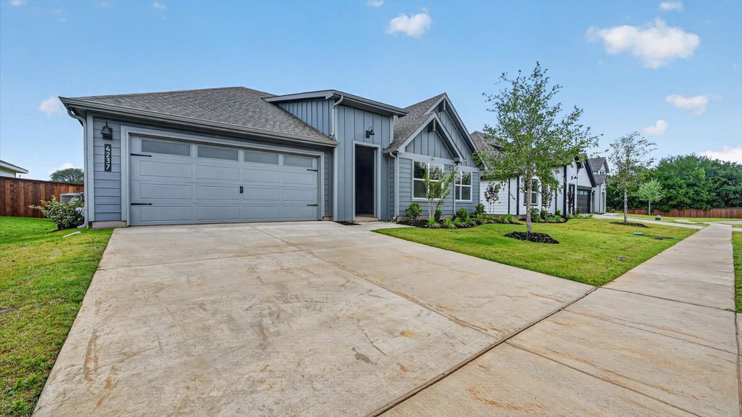 Representative exterior photo of a completed home built from the Harrison by D.R. Horton in Sandstone Estates, Granbury, TX (Image 2). Representative exterior photo of a completed home built from the Harrison by D.R. Horton in Sandstone Estates, Granbury, TX (Image 2).