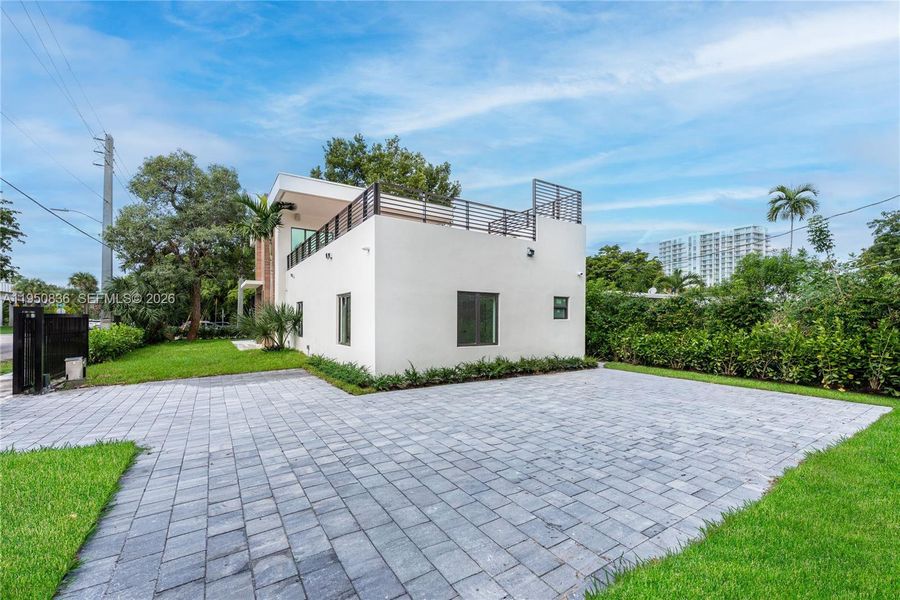 Exterior details and patio area of a home in , Miami (Image 20). Exterior details and patio area of a home in , Miami (Image 20).