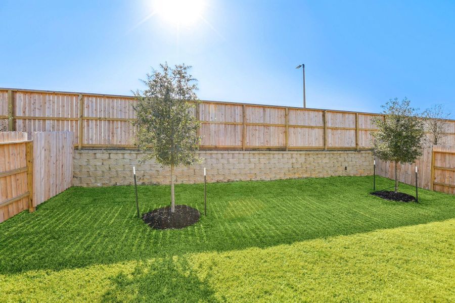 Exterior details and patio area of a home in Pine Lake Cove - Premier Series, Montgomery (Image 3).