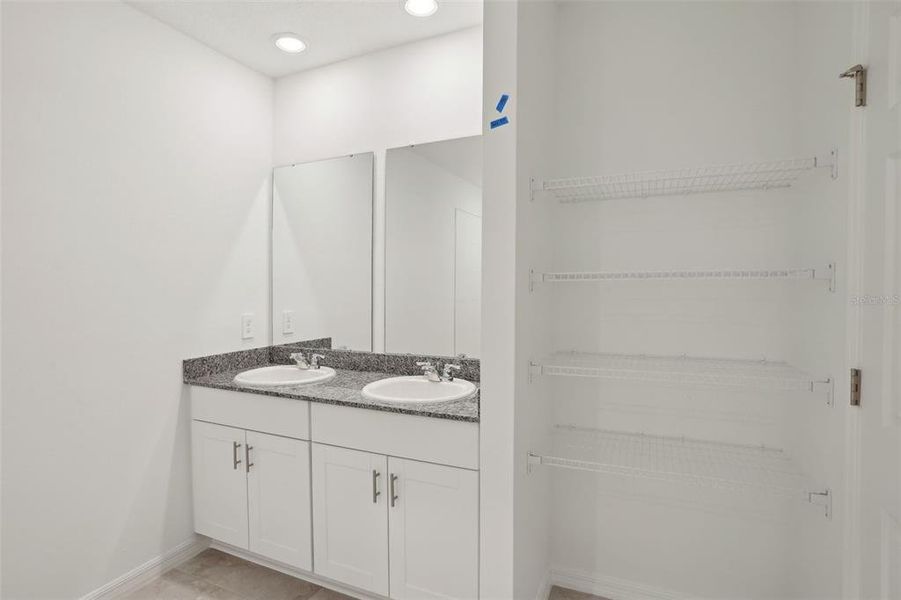 Furnished interior view inside a new home in Lake Deer Estates - Signature Series, Poinciana (Image 10). Furnished interior view inside a new home in Lake Deer Estates - Signature Series, Poinciana (Image 10).