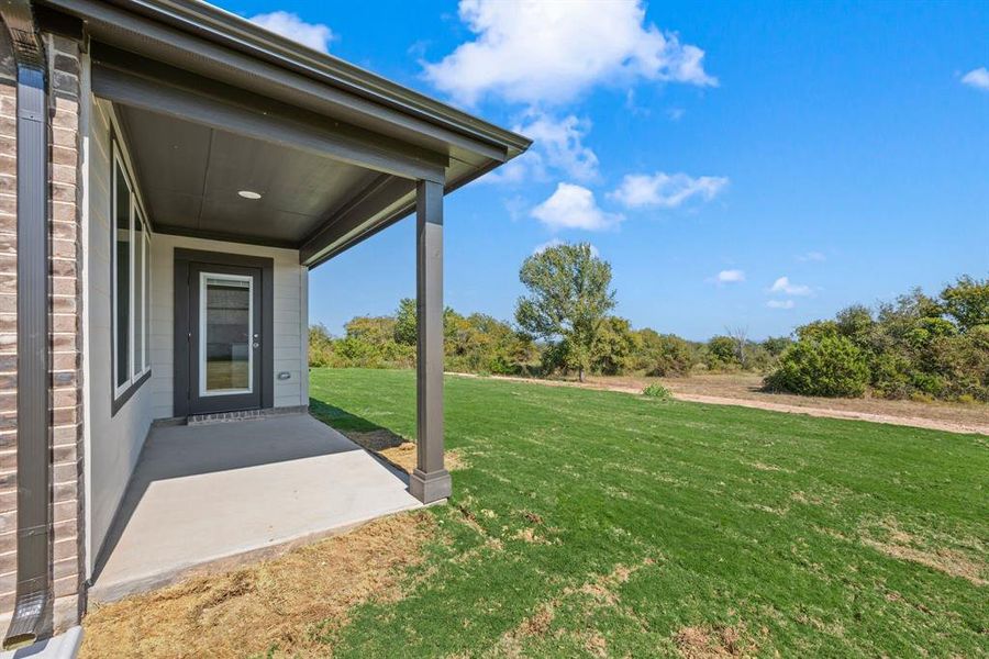 Exterior details and patio area of a home in Gatlin Ranch, Springtown (Image 15). Exterior details and patio area of a home in Gatlin Ranch, Springtown (Image 15).
