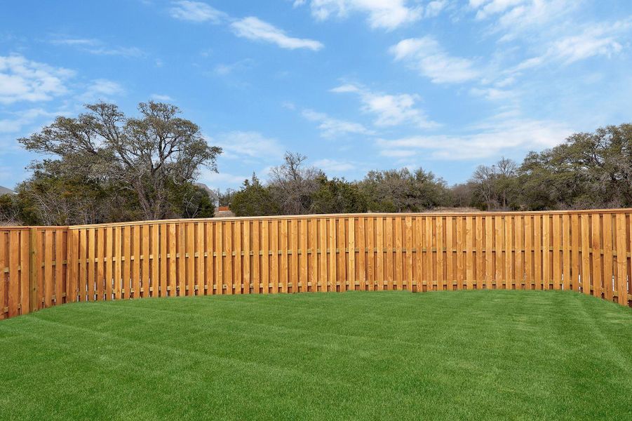 Exterior details and patio area of a home in Parmer Ranch, Georgetown (Image 20).