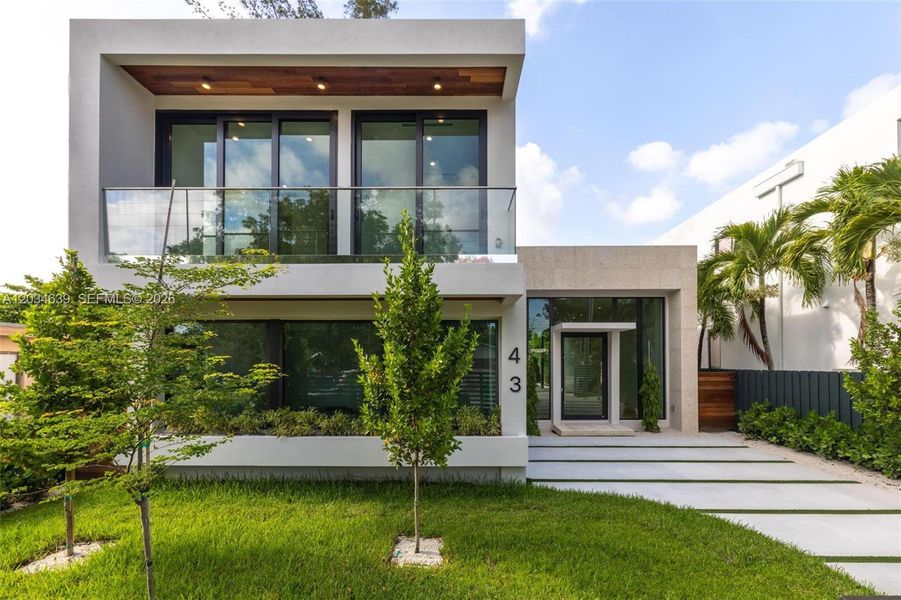 Front exterior of a new home in , Miami, FL, highlighting curb appeal (Image 1). Front exterior of a new home in , Miami, FL, highlighting curb appeal (Image 1).