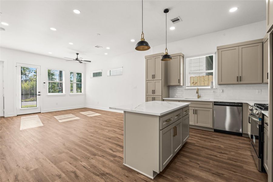 The layout buyers dream about. See how the kitchen island directly overlooks the entire main floor, keeping you in the center of the action.