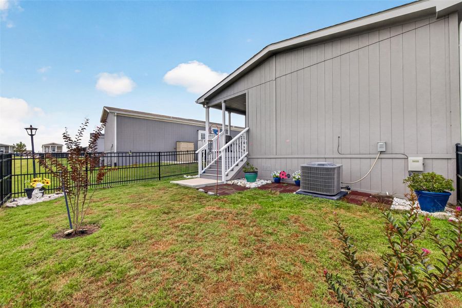 Exterior details and patio area of a home in , Willis (Image 28).