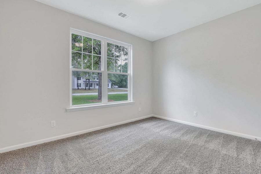 Representative unfurnished interior of a home built from the The Brookhaven by Smith Family Homes in Ramsey Landing, Rincon (Image 33).