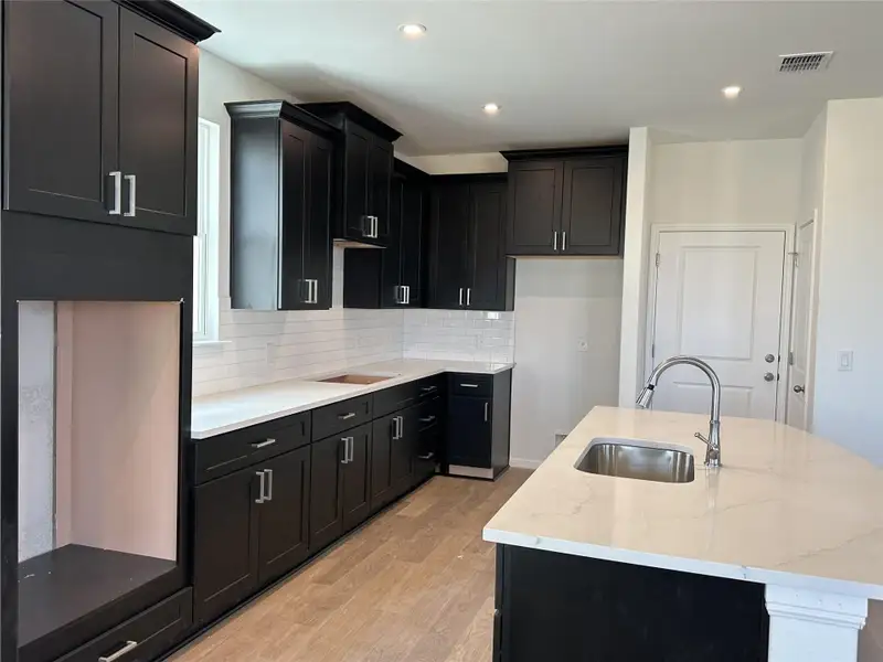 Furnished interior view inside a new home in Porter Country, Buda (Image 5). Furnished interior view inside a new home in Porter Country, Buda (Image 5).