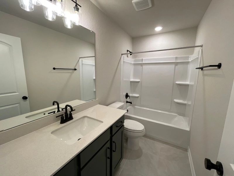 Furnished interior view inside a new home in Covered Bridge, Hutto (Image 13). Furnished interior view inside a new home in Covered Bridge, Hutto (Image 13).