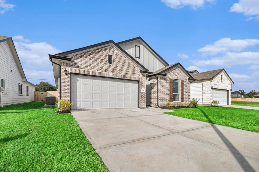 Front exterior of a new home in , Bay City, TX, highlighting curb appeal (Image 22).