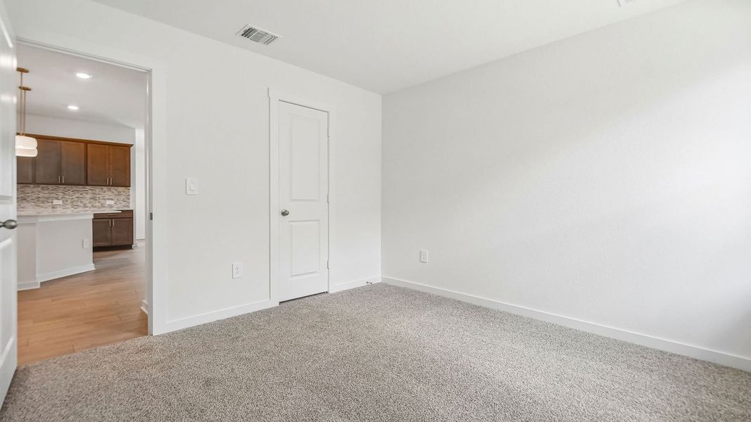 Spacious, unfurnished interior of a new home in Trails at Wildhorse, Austin (Image 25).