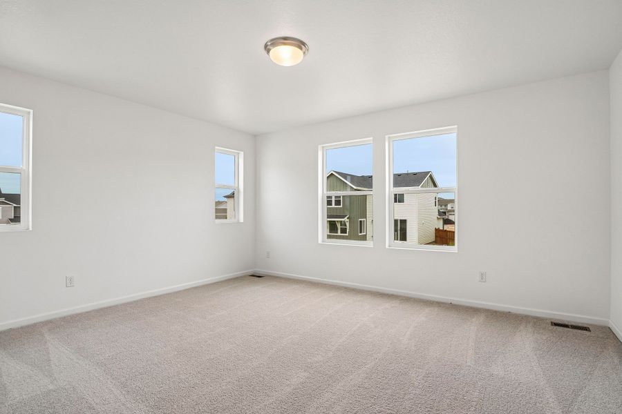 Spacious, unfurnished interior of a new home in Sky Ranch, Watkins (Image 17).