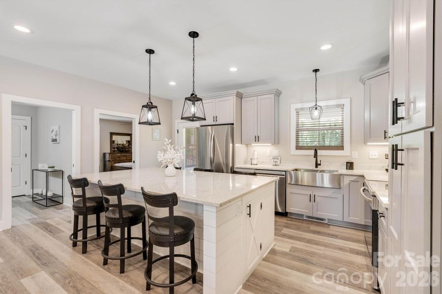 Furnished interior view inside a new home in , Lenoir (Image 10).