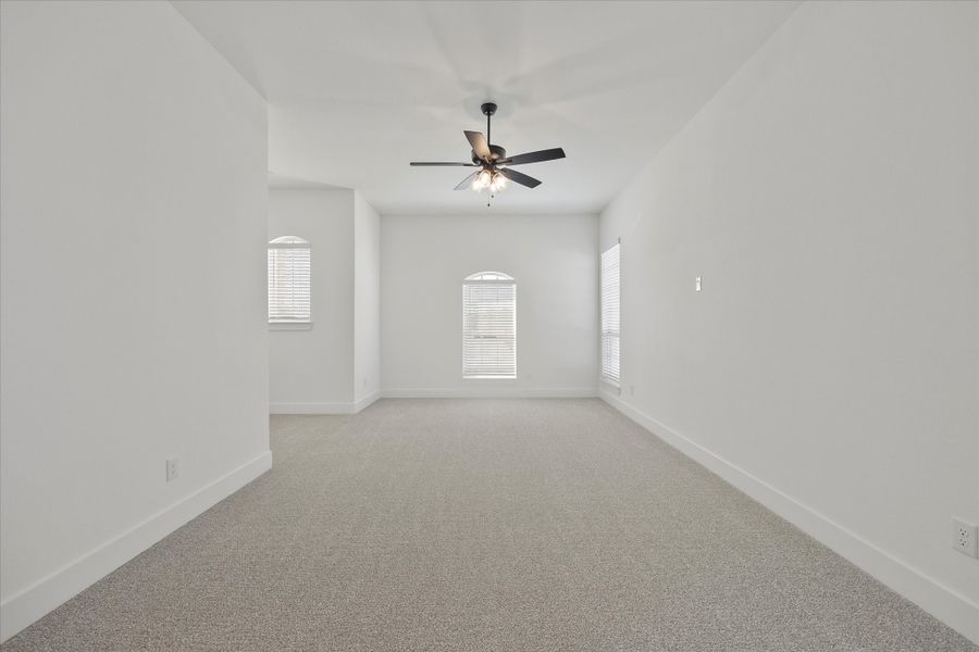 Representative unfurnished interior of a home built from the Davenport by Windsor Homes in Winding Creek, Rockwall (Image 28).