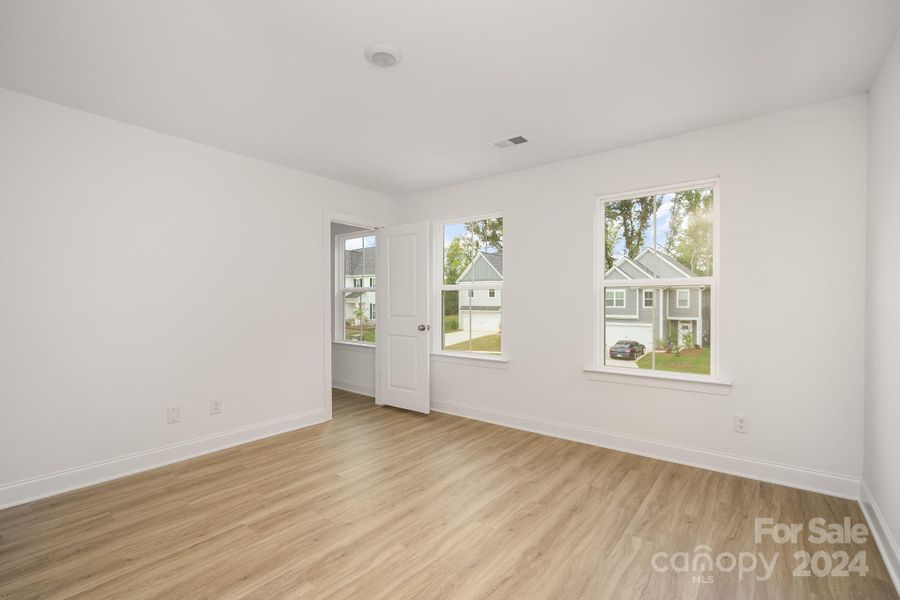 Representative Photo. Secondary bedroom with double windows