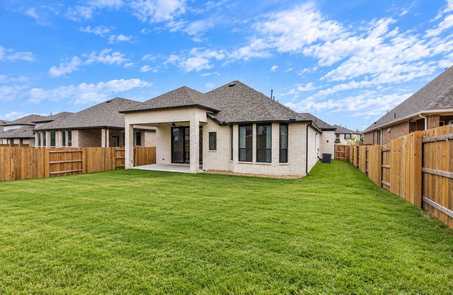 Exterior details and patio area of a home in 6 Creeks at Waterridge, Kyle (Image 3).