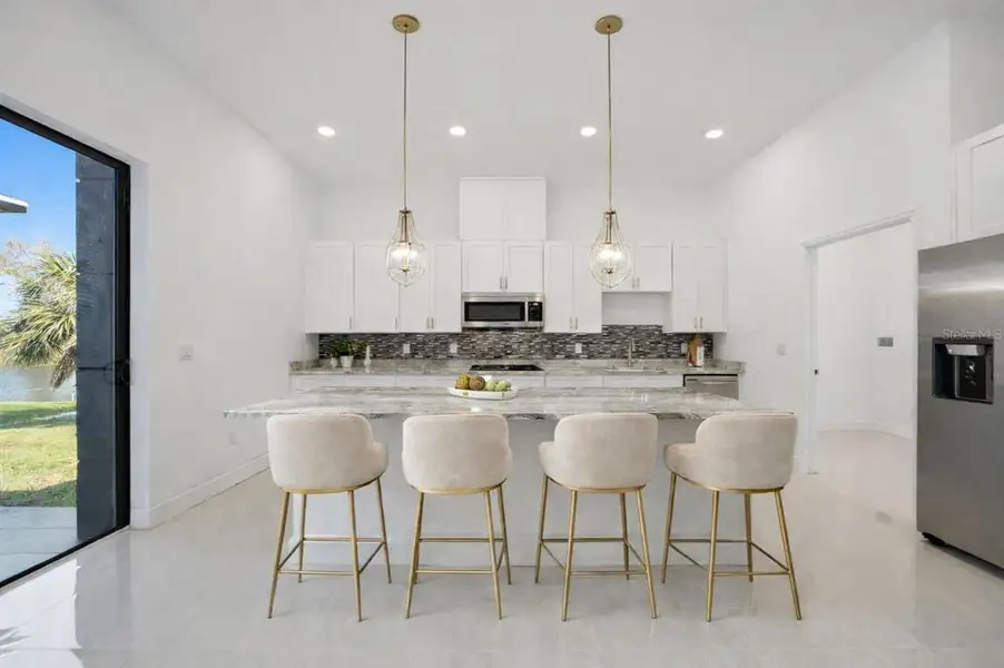 Furnished interior view inside a new home in , Port Charlotte (Image 13).