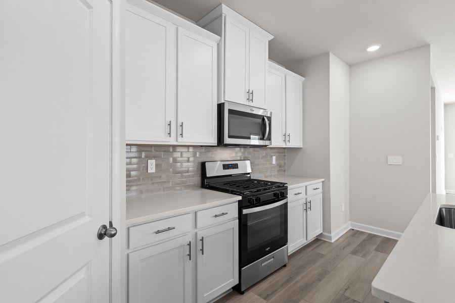 Furnished interior view inside a new home in Cypress Ridge - The Boardwalk Series, Longs (Image 6).