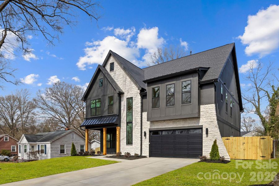 Front exterior of a new home in , Charlotte, NC, highlighting curb appeal (Image 27).
