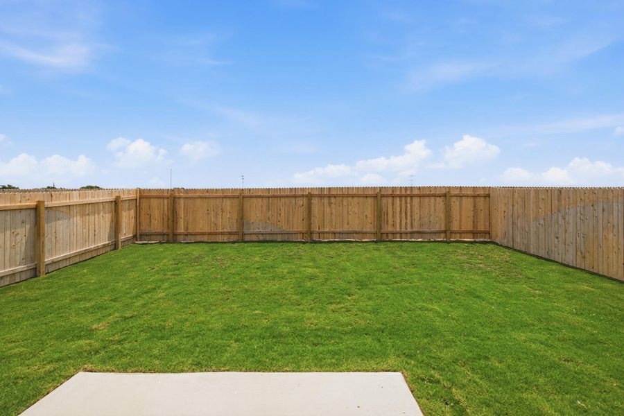 Exterior details and patio area of a home in Stallion Run, Buda (Image 27).
