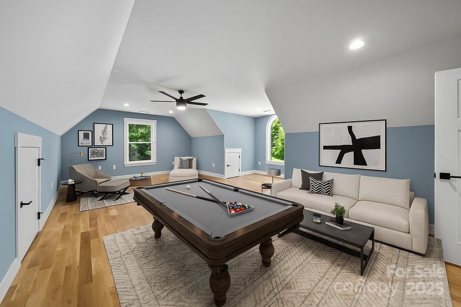 Virtually staged upper level recreation room