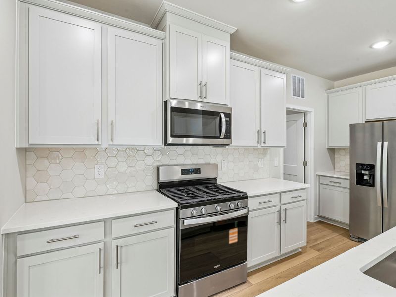 Furnished interior view inside a new home in Avalon Place - Classic Series, Durham (Image 4).