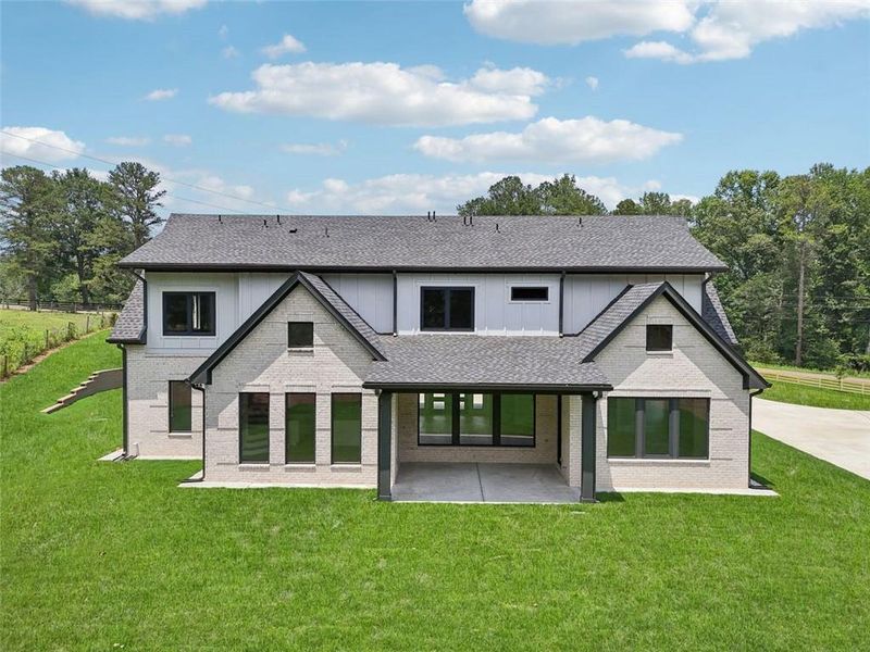 Front exterior of a new home in , Braselton, GA, highlighting curb appeal (Image 39). Front exterior of a new home in , Braselton, GA, highlighting curb appeal (Image 39).