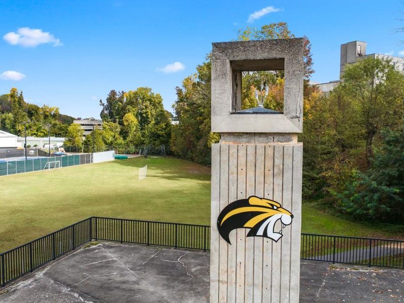 Front exterior of a new home in Falcon Landing, Gainesville, GA, highlighting curb appeal (Image 22).