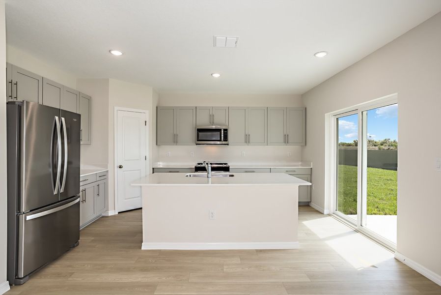 Furnished interior view inside a new home in Scenic Terrace, Haines City (Image 6).
