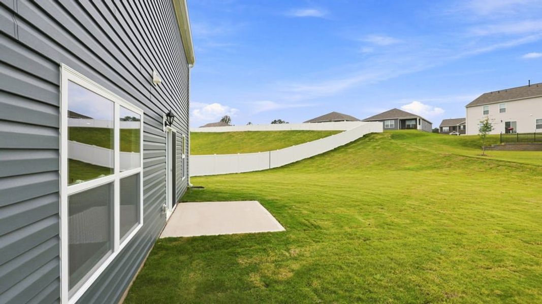 Exterior details and patio area of a home in Lakestone, Woodruff (Image 20).