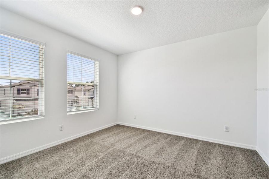 Spacious, unfurnished interior of a new home in Meadow Oaks, Hudson (Image 30).