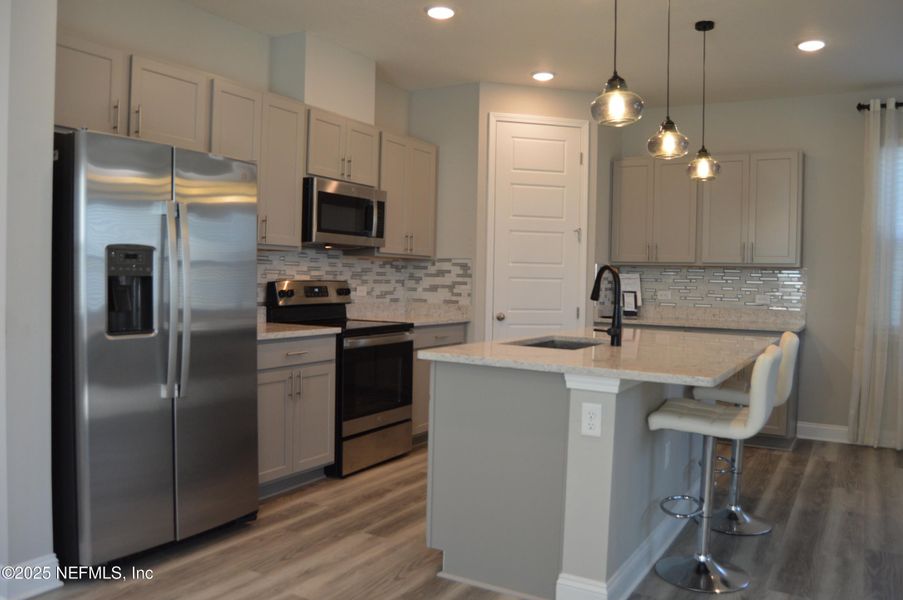 Furnished interior view inside a new home in , Jacksonville (Image 5). Furnished interior view inside a new home in , Jacksonville (Image 5).
