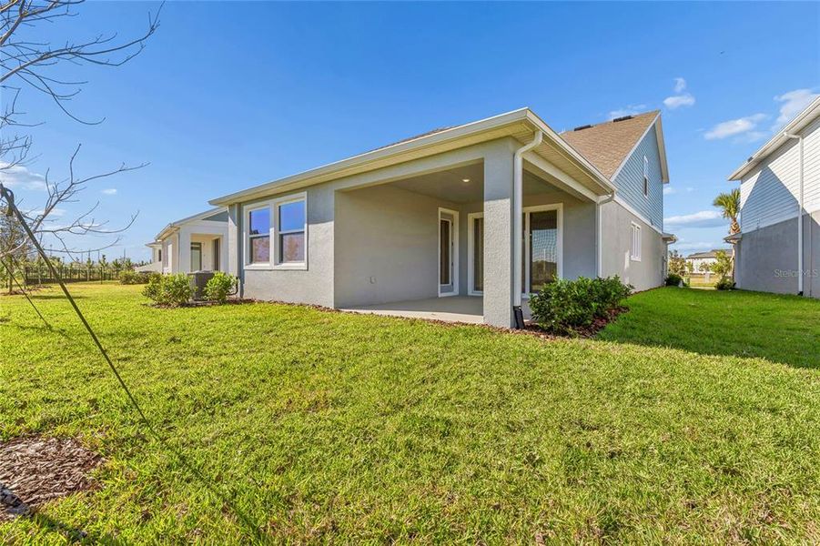 Exterior details and patio area of a home in Chapel Crossings - Garden Series, Wesley Chapel (Image 25). Exterior details and patio area of a home in Chapel Crossings - Garden Series, Wesley Chapel (Image 25).