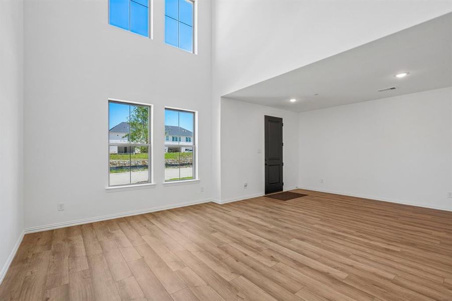 Featuring volume windows in the family room, this beautiful home is filled with natural light. Featuring volume windows in the family room, this beautiful home is filled with natural light.
