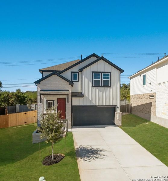 Front exterior of a new home in Park Hill Commons, San Antonio, TX, highlighting curb appeal (Image 1).