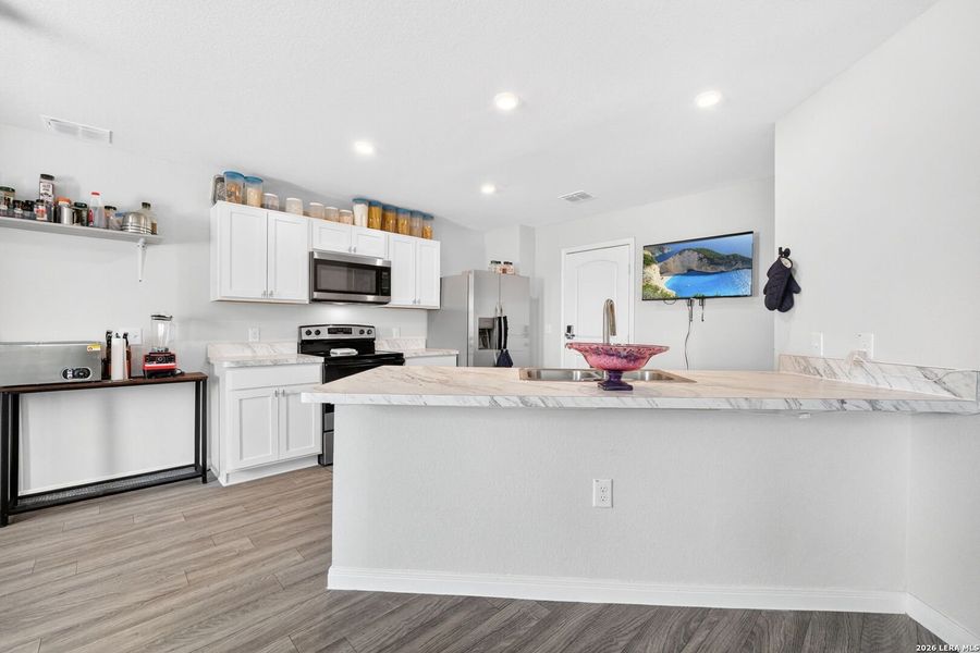 Furnished interior view inside a new home in Mission Del Lago, San Antonio (Image 30).