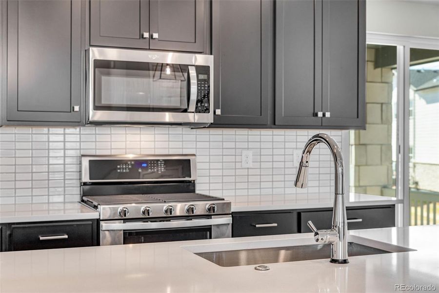 Furnished interior view inside a new home in Crescendo at The Aurora Highlands, Aurora (Image 10).