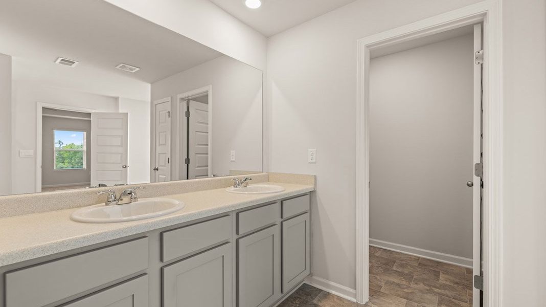 Representative furnished interior of a home built from the Grayson by D.R. Horton in Highland Hills, Graniteville (Image 8).