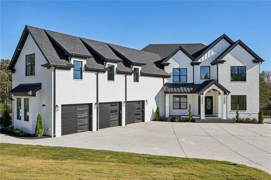 Front exterior of a new home in , Buford, GA, highlighting curb appeal (Image 1).