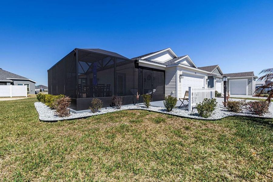 Front exterior of a new home in , The Villages, FL, highlighting curb appeal (Image 25).